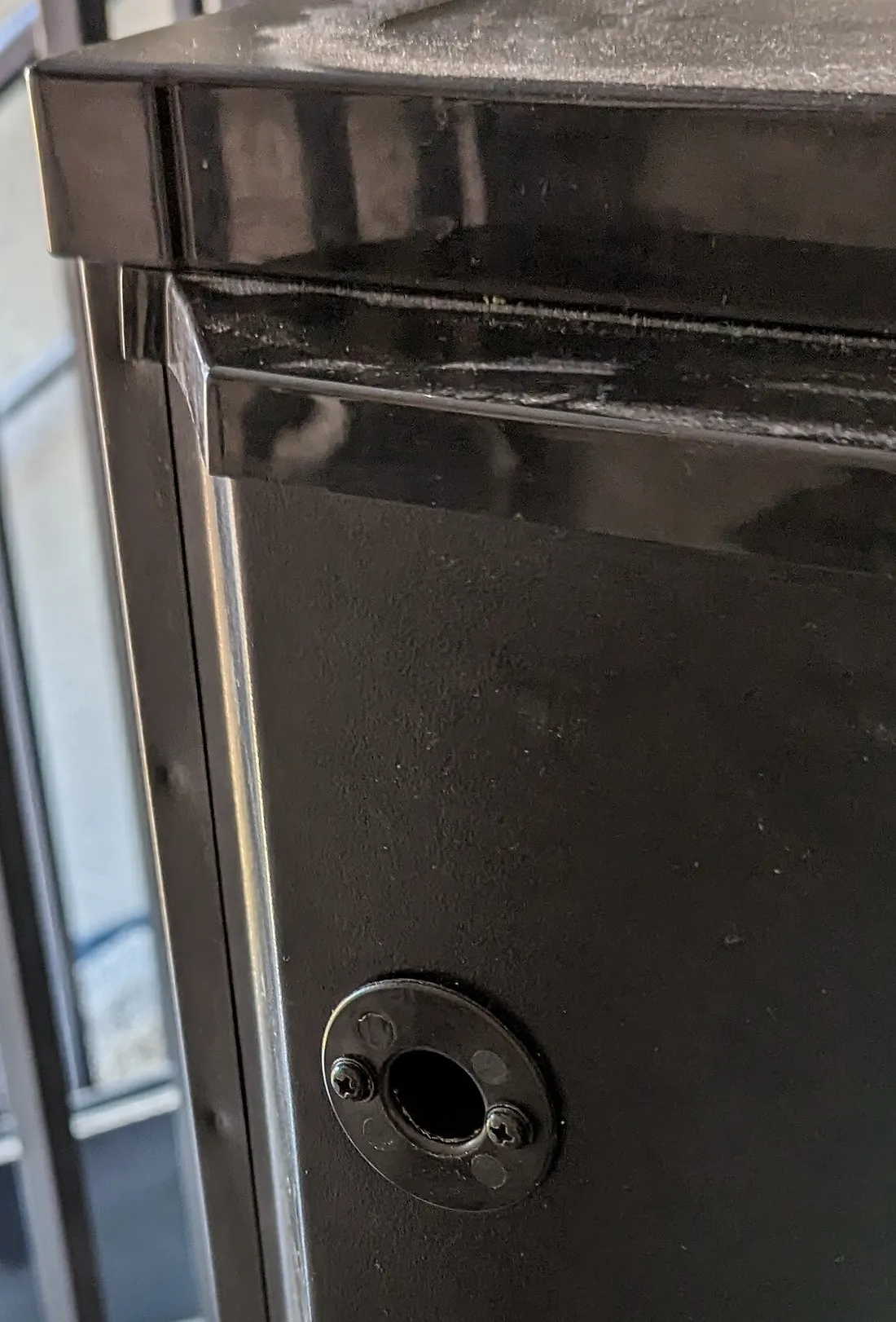 rear of the kegerator, showing the existing hole